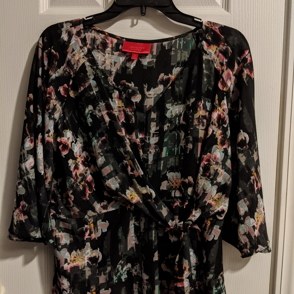 Jennifer Lopez black flowered shirt